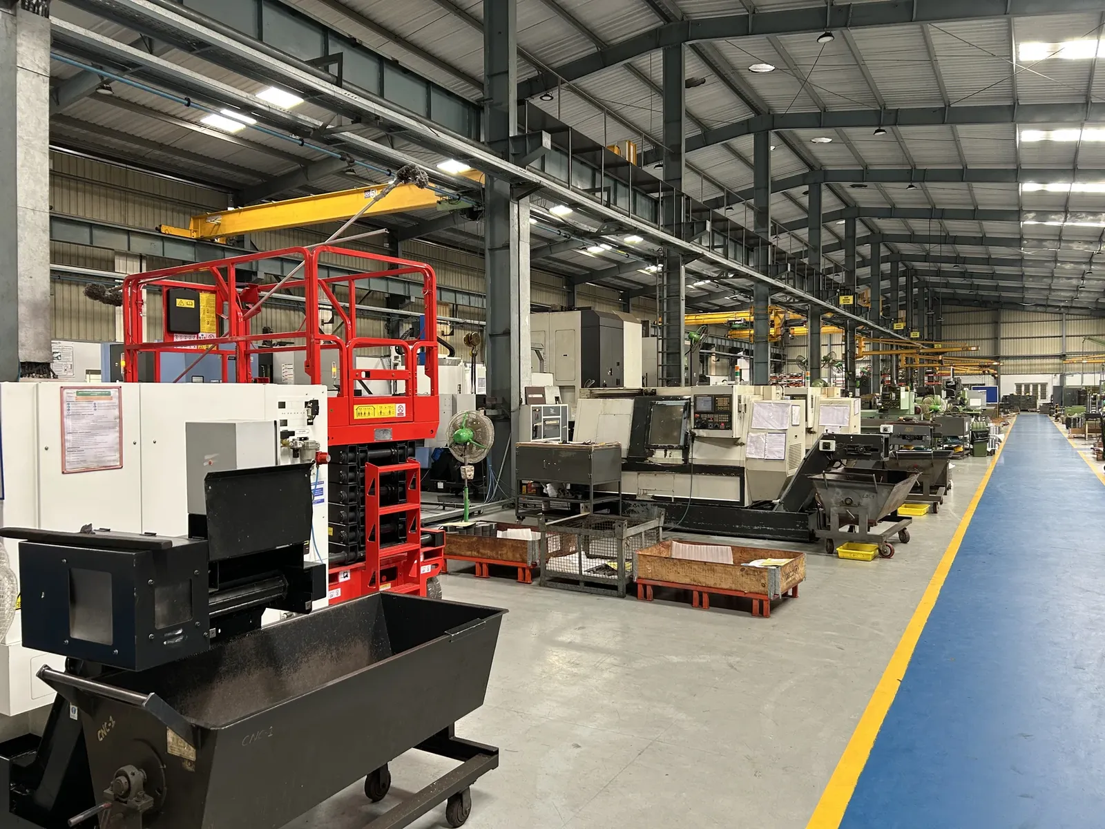 Machining centers and industrial equipment at a partner manufacturing facility